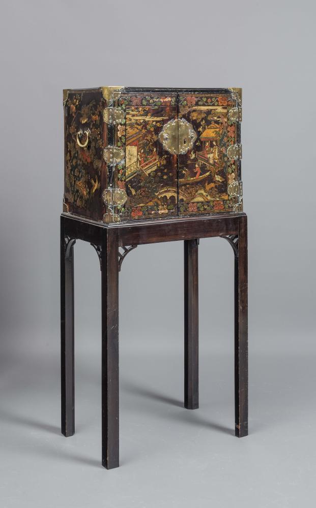 A CHINESE BLACK LACQUERED CABINET ON STAND Image