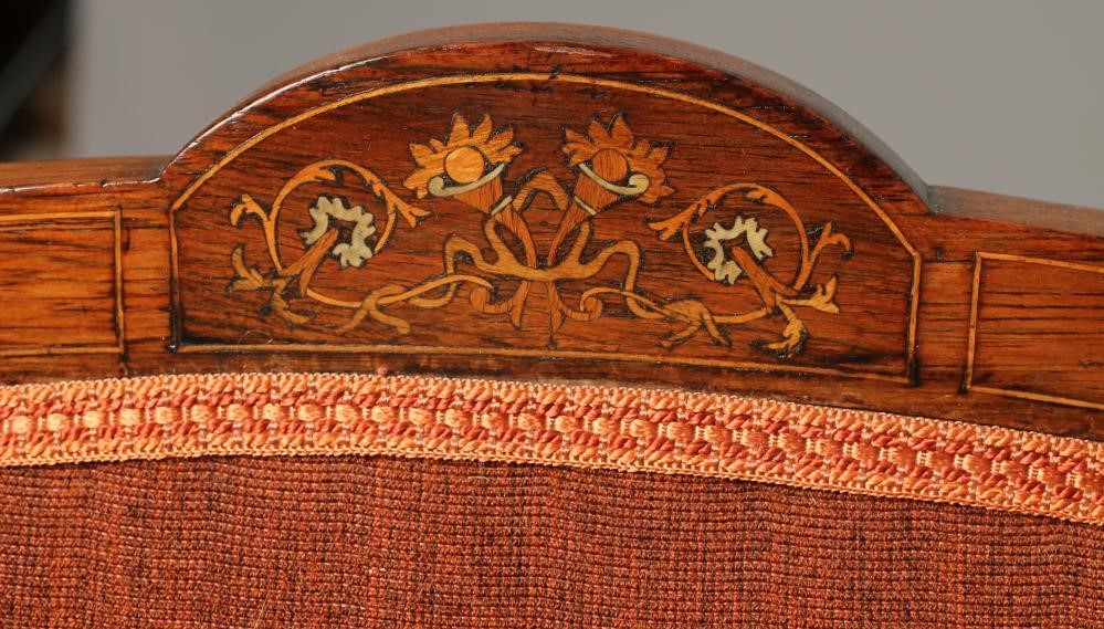 AN EDWARDIAN ROSEWOOD FRAMED ARMCHAIR with stringing and upholstered in a rust coloured weave Image