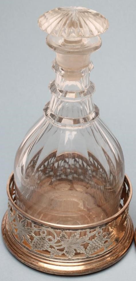 A PAIR OF PLATED ON COPPER BOTTLE COASTERS of plain cylindrical form Image