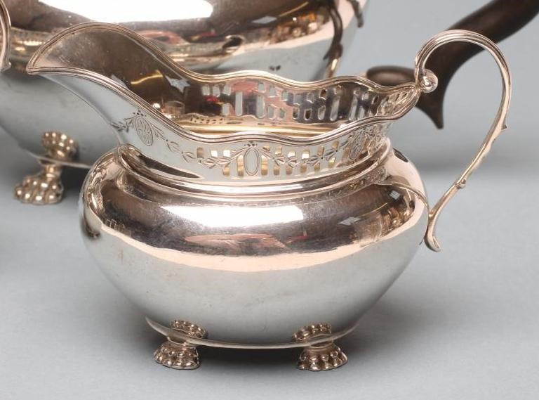 *A FOUR PIECE SILVER TEA AND COFFEE SERVICE Image