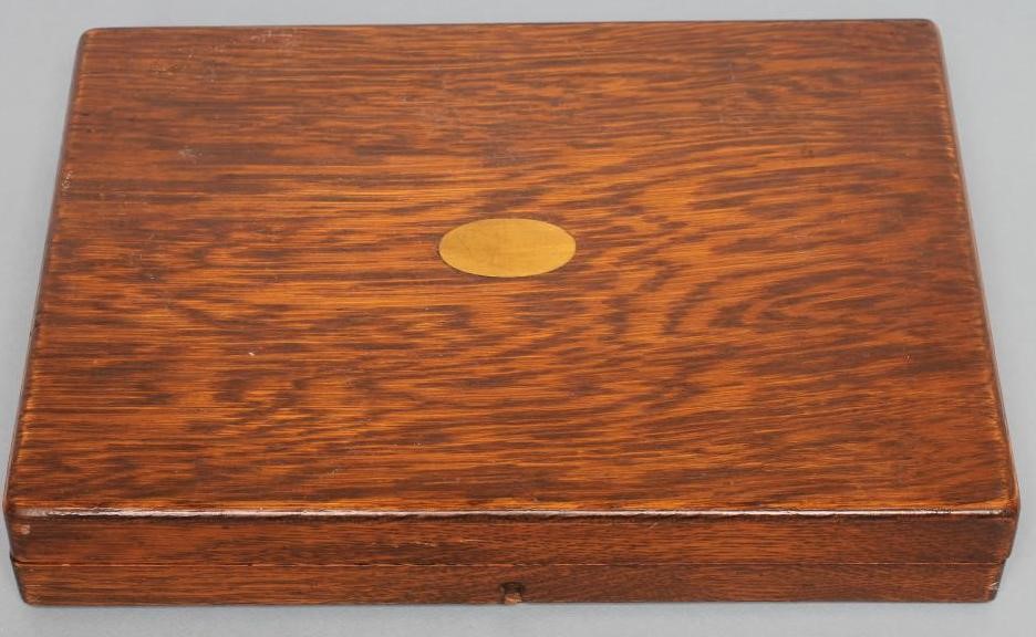 *A SET OF TWELVE PAIRS OF SILVER FISH KNIVES AND FORKS Image