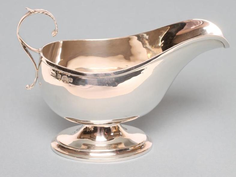 A SILVER SAUCEBOAT Image
