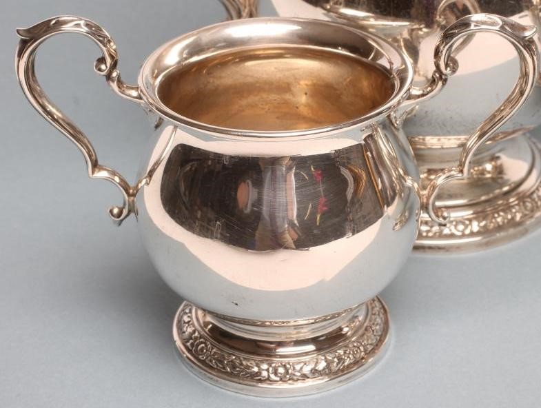 *A FIVE PIECE SILVER TEA SERVICE Image