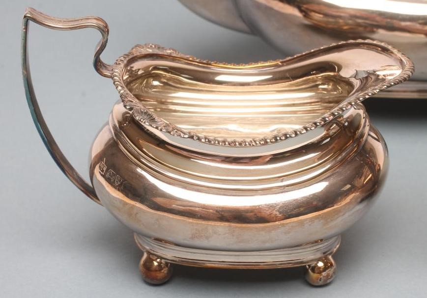 A THREE PIECE SILVER TEA SERVICE Image