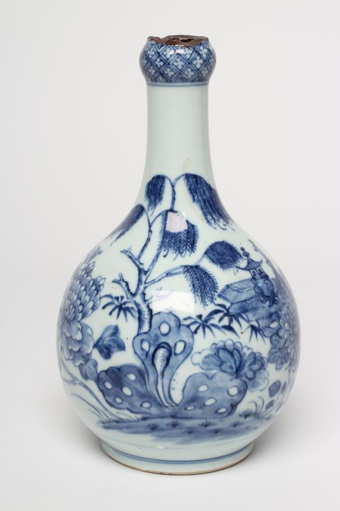 A CHINESE PORCELAIN GUGLET of typical bottle form, painted in underglaze blue with a pagoda in Image