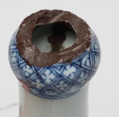 A CHINESE PORCELAIN GUGLET of typical bottle form, painted in underglaze blue with a pagoda in Image