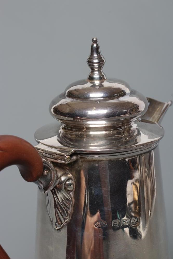 A SILVER CAFÉ-AU-LAIT POT Image