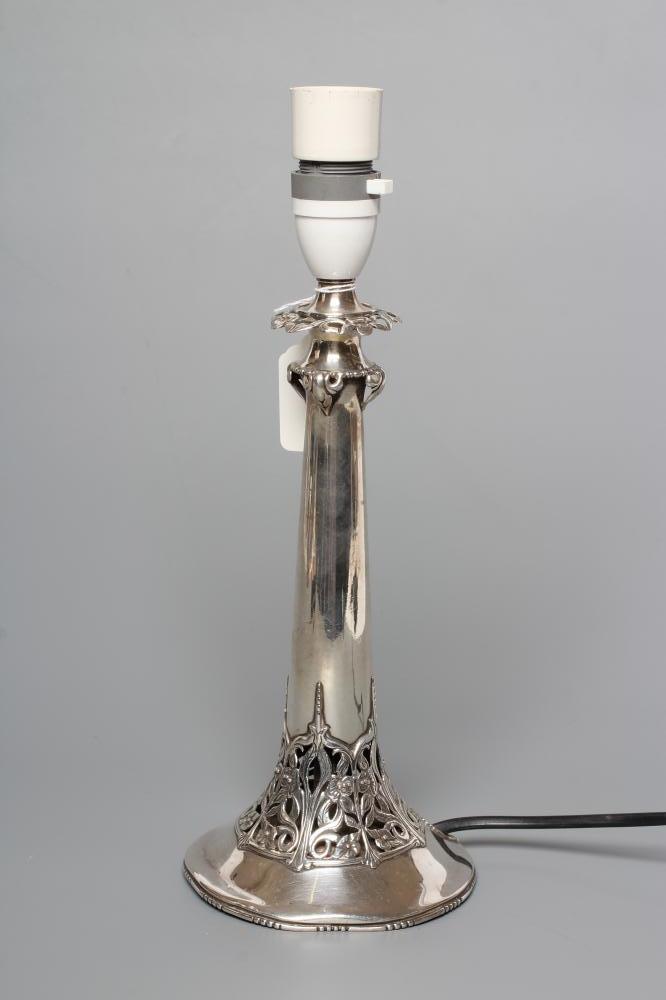 A SILVER ELECTRIC TABLE LAMP BASE Image