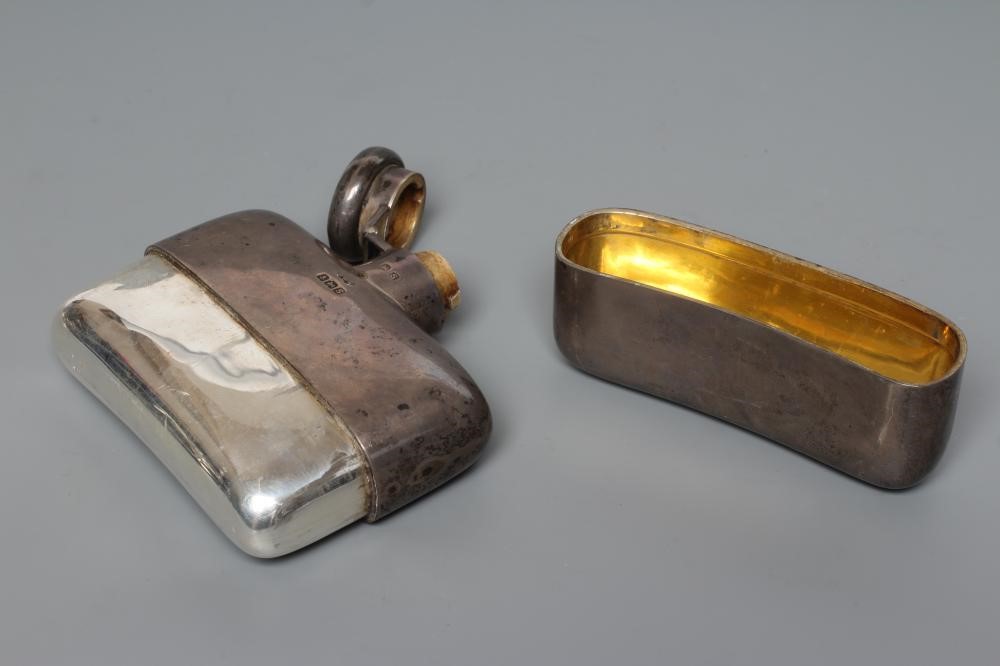 A SILVER HIP FLASK Image