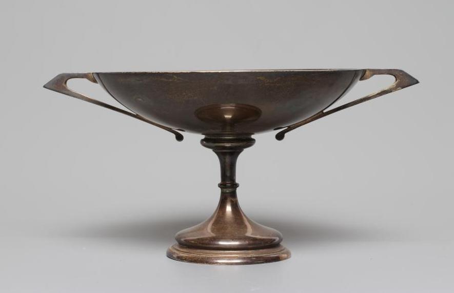 A SMALL SILVER TROPHY Image