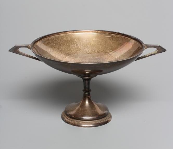 A SMALL SILVER TROPHY Image