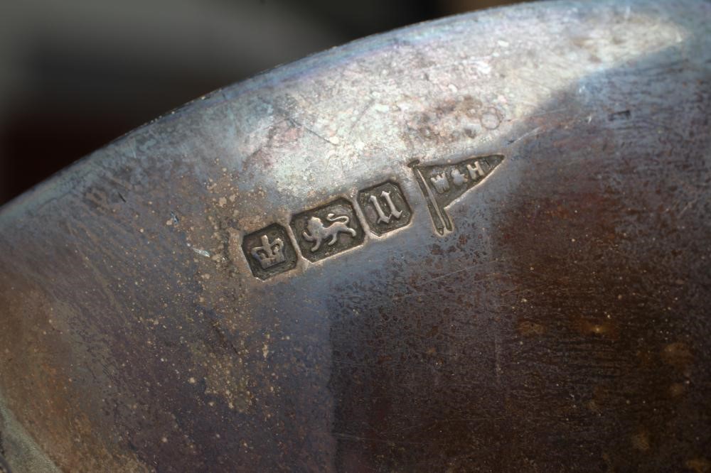 A SMALL SILVER TROPHY Image