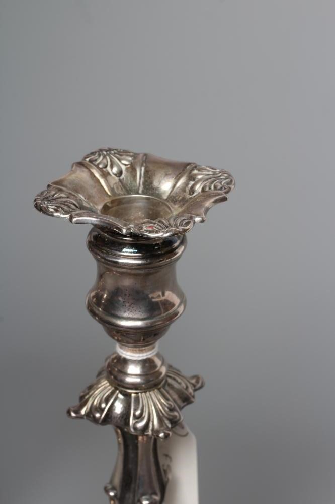 A PAIR OF VICTORIAN SILVER CANDLESTICKS Image