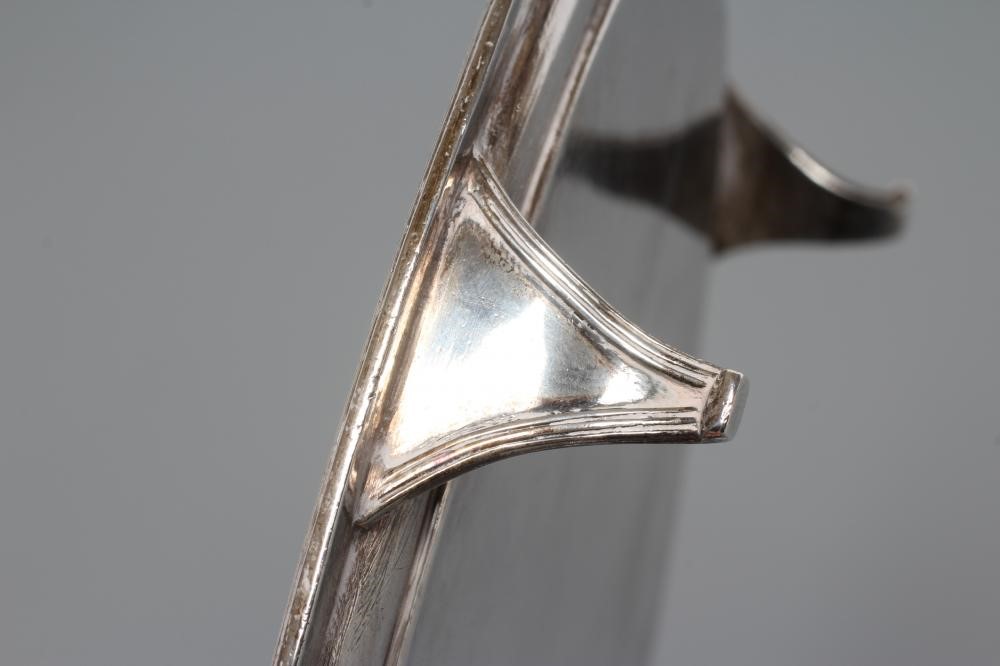 A GEORGE III SILVER OVAL TRAY, by Peter and Ann Bateman, London 1798, with applied reeded rim raised Image