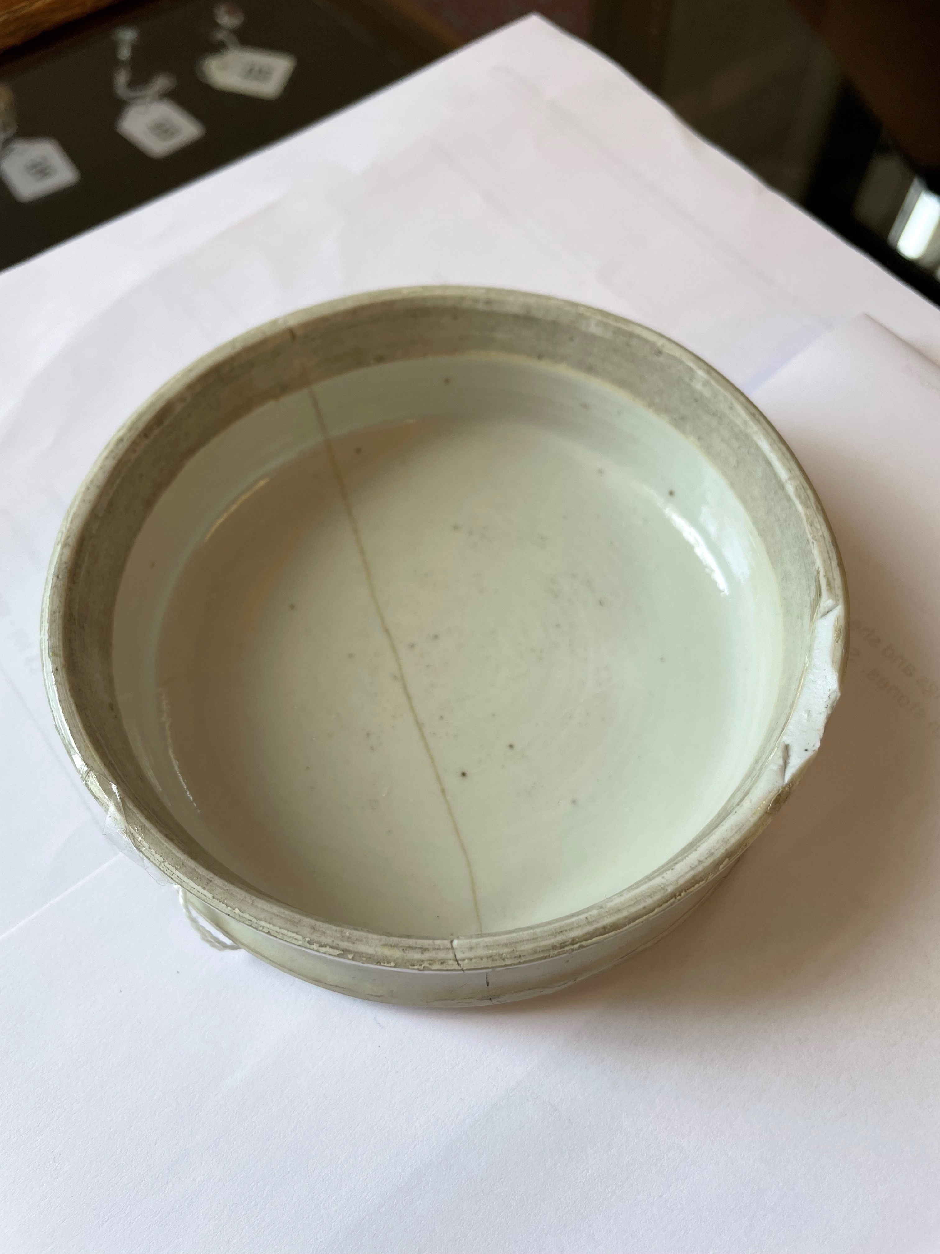 A CHINESE PORCELAIN LARGE JAR AND COVER painted in colours with a finch perched upon a blossoming Image