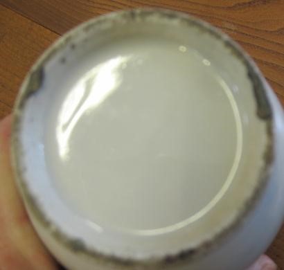 A CHINESE PORCELAIN SMALL COFFEE POT AND COVER of baluster form with ear shaped handle Image