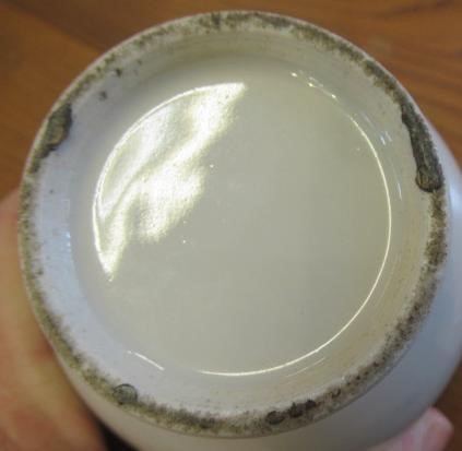 A CHINESE PORCELAIN SMALL COFFEE POT AND COVER of baluster form with ear shaped handle Image