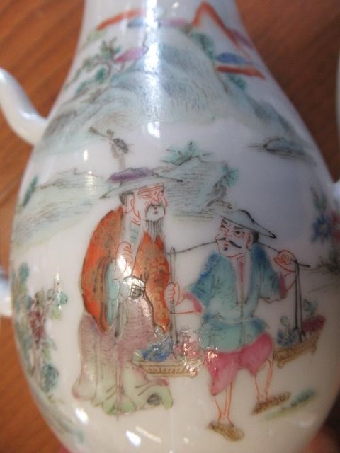 A CHINESE PORCELAIN SMALL COFFEE POT AND COVER of baluster form with ear shaped handle Image