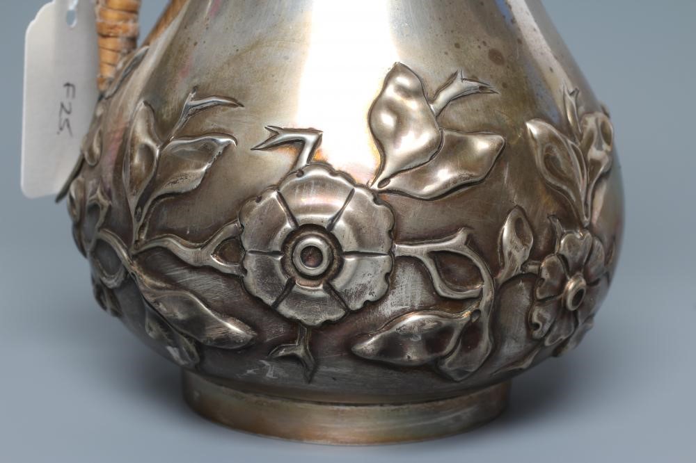 A LATE VICTORIAN ART NOUVEAU SILVER HOT WATER JUG Image