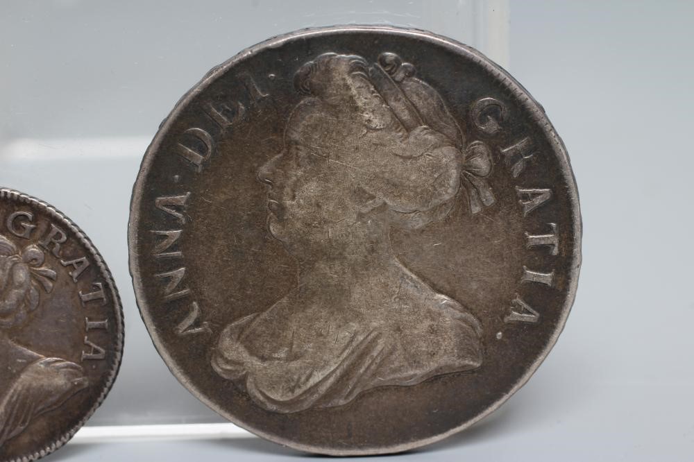 TWO QUEEN ANNE SILVER COINS, comprising 1706 crown with crowned cruciform back, plumes and roses, Image