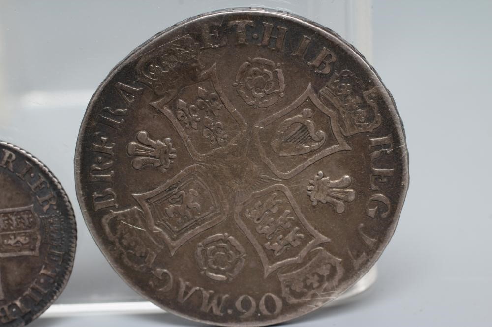 TWO QUEEN ANNE SILVER COINS, comprising 1706 crown with crowned cruciform back, plumes and roses, Image