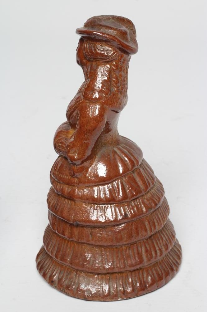 TWO BROWN SALTGLAZE STONEWARE FIGURES Image