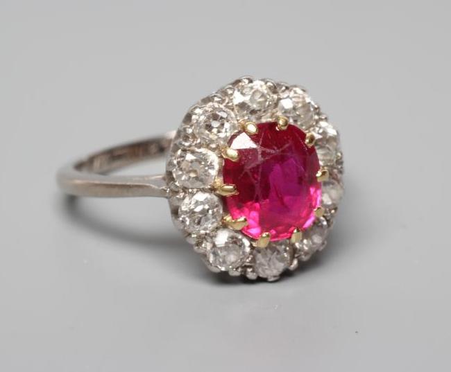 A RUBY AND DIAMOND CLUSTER RING Image