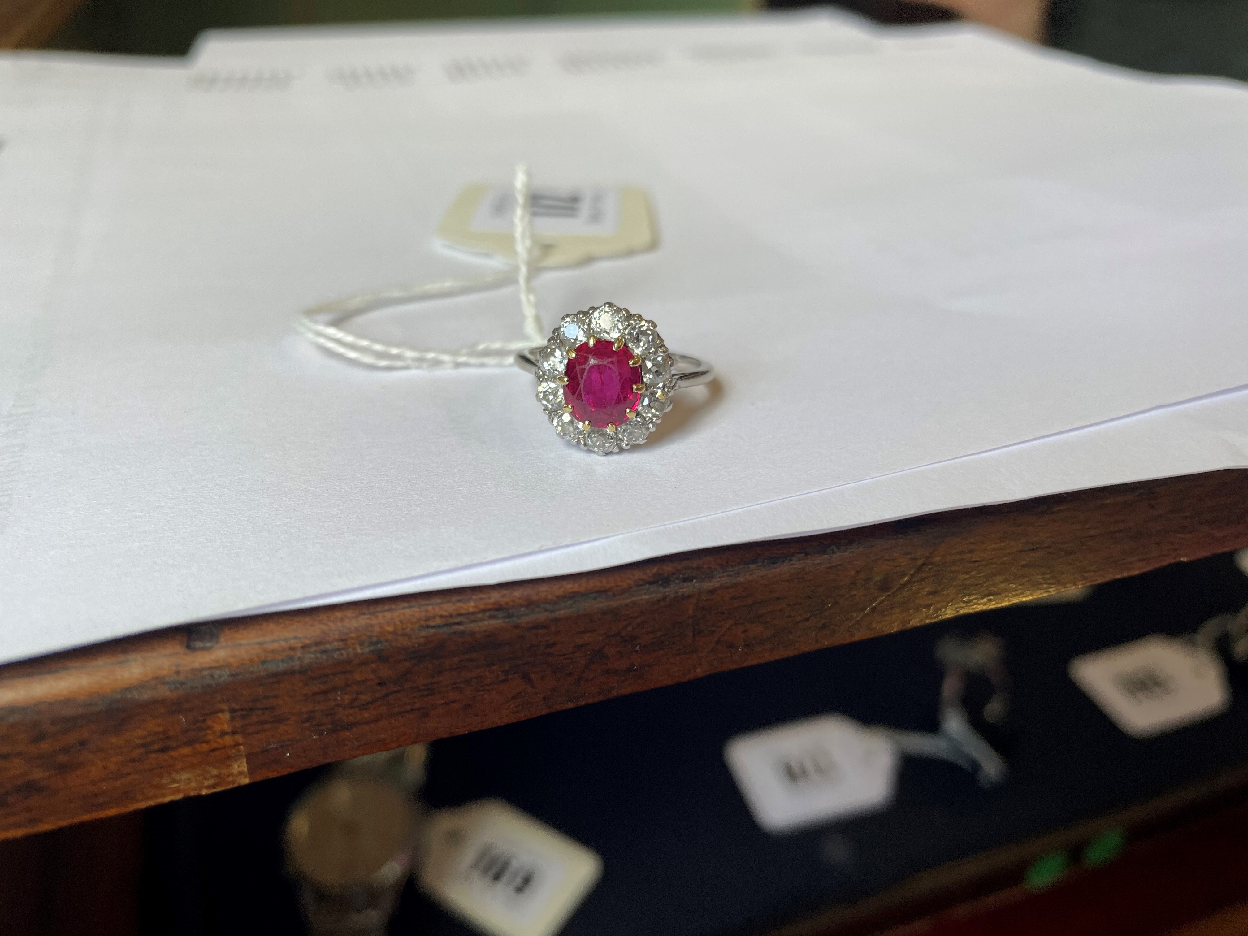 A RUBY AND DIAMOND CLUSTER RING Image