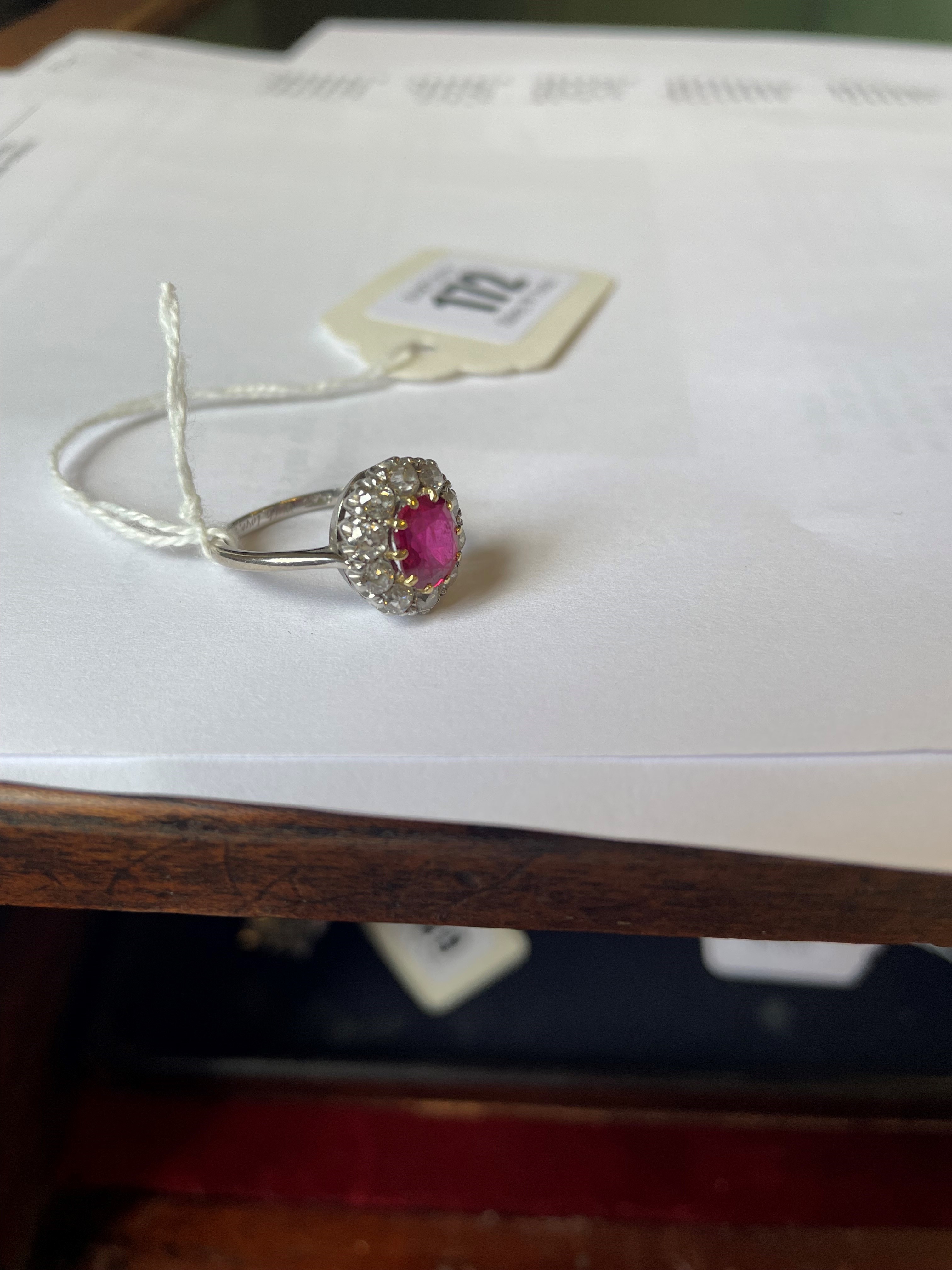 A RUBY AND DIAMOND CLUSTER RING Image