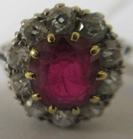 A RUBY AND DIAMOND CLUSTER RING Image