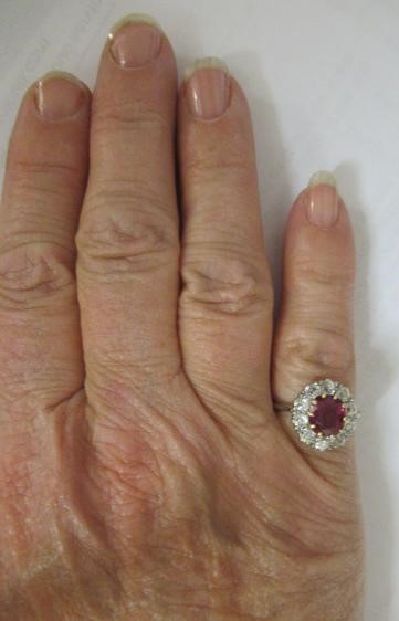 A RUBY AND DIAMOND CLUSTER RING Image