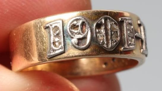 A SILVER WEDDING ANNIVERSARY DIAMOND HALF HOOP BAND Image