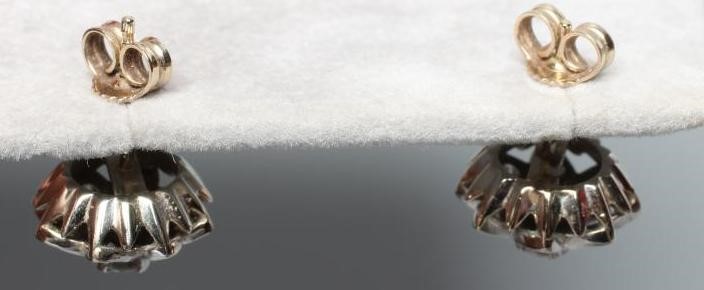 A PAIR OF DIAMOND CLUSTER EAR STUDS Image