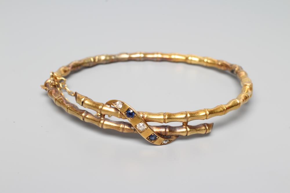A LATE VICTORIAN STIFF HINGED FAUX BAMBOO BANGLE Image