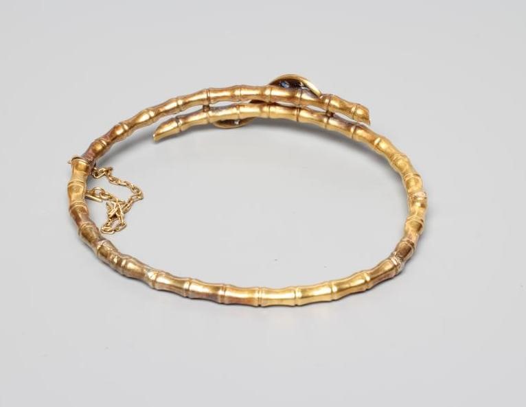 A LATE VICTORIAN STIFF HINGED FAUX BAMBOO BANGLE Image