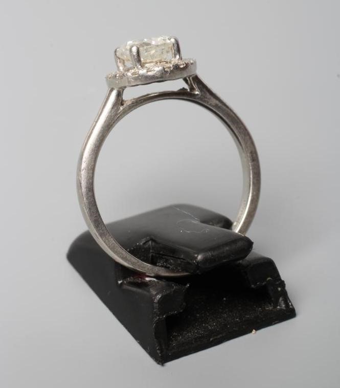 A DIAMOND CLUSTER RING Image