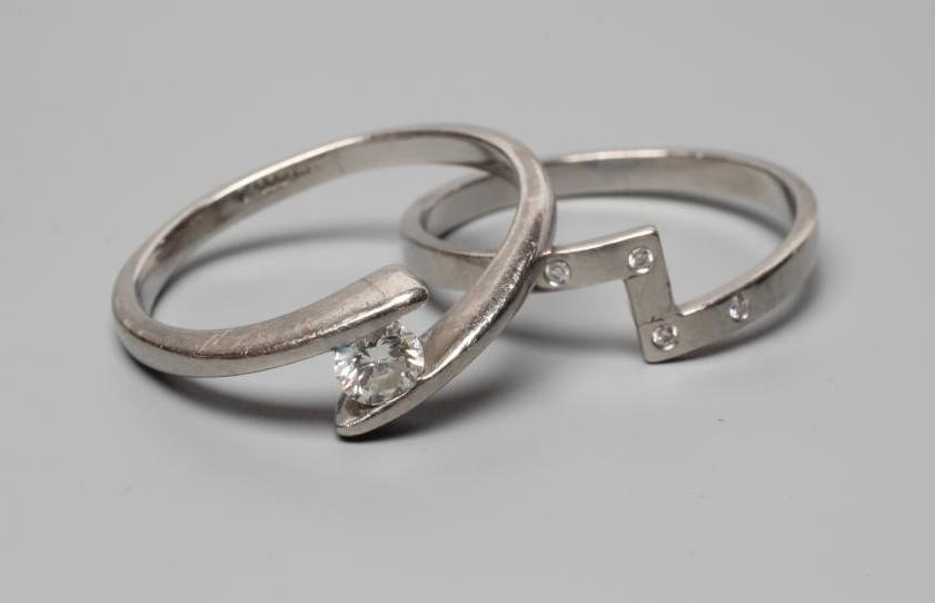A PALLADIUM DIAMOND ENGAGEMENT AND MATCHING WEDDING RINGS Image