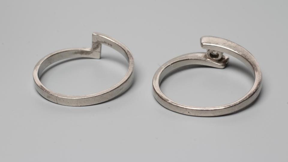 A PALLADIUM DIAMOND ENGAGEMENT AND MATCHING WEDDING RINGS Image