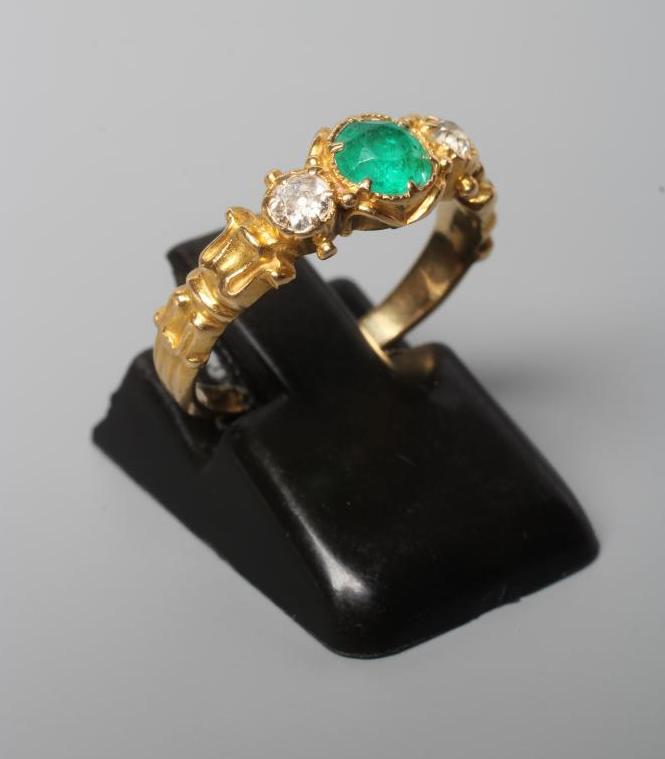 AN EMERALD AND DIAMOND RING Image
