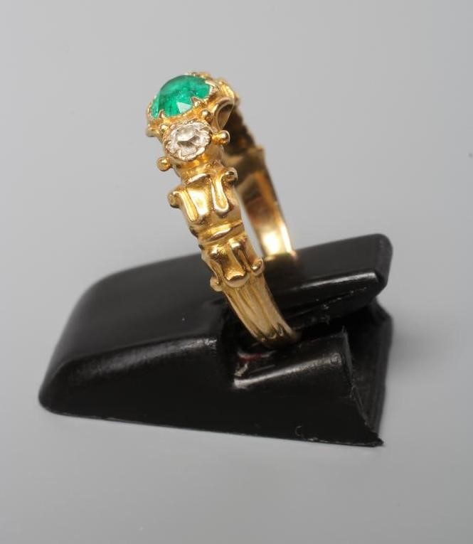 AN EMERALD AND DIAMOND RING Image