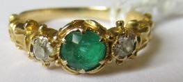 AN EMERALD AND DIAMOND RING Image
