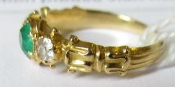 AN EMERALD AND DIAMOND RING Image