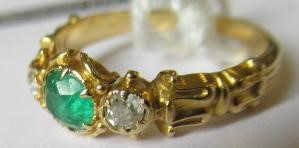 AN EMERALD AND DIAMOND RING Image