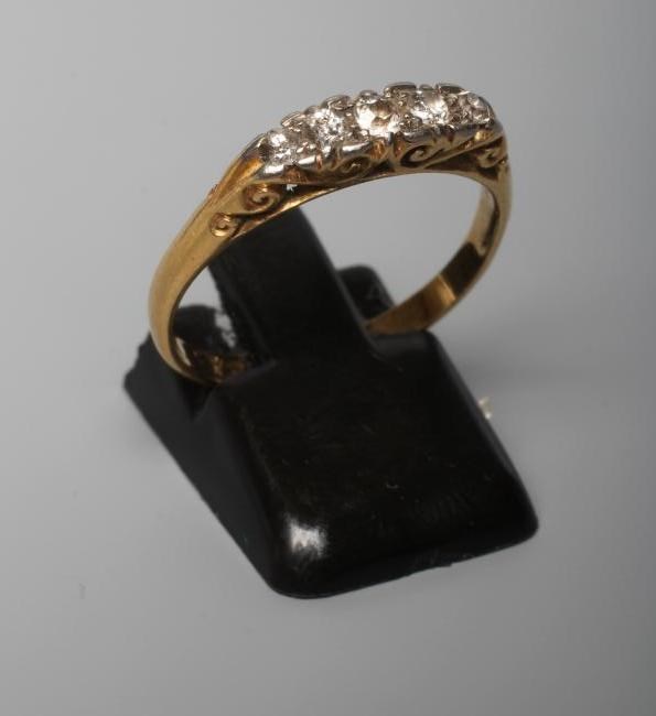 A victorian five stone diamond ring, the graduated old cut stones point ...