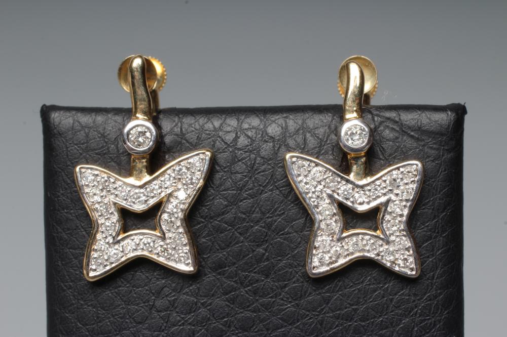 A PAIR OF DIAMOND EARRINGS Image