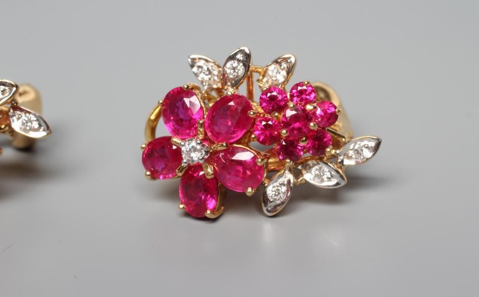 A PAIR OF RUBY AND DIAMOND COCKTAIL EARRINGS Image