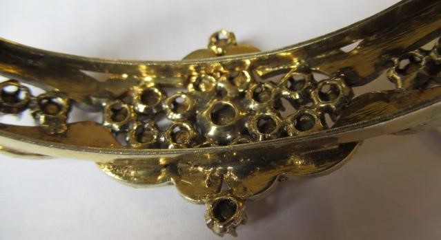 A DIAMOND STIFF HINGED BANGLE Image