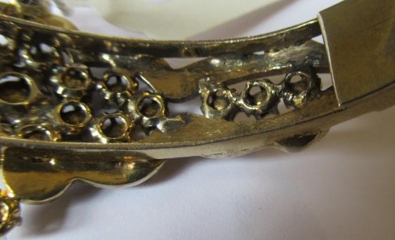 A DIAMOND STIFF HINGED BANGLE Image