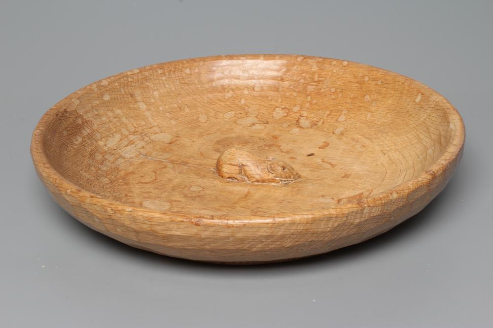 A ROBERT THOMPSON ADZED OAK FRUIT BOWL of shallow circular form with carved mouse trademark in high Image