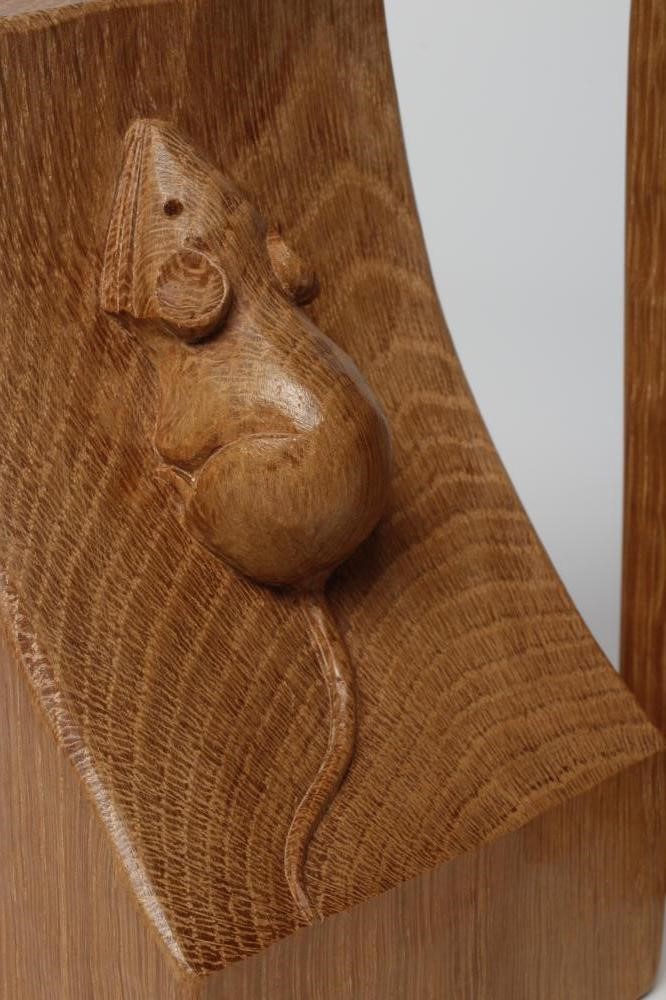 A PAIR OF ROBERT THOMPSON ADZED OAK BOOKENDS of dished square form with carved mouse trademark in Image